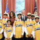 President Barack Obama and first lady Michelle Obama meet with the Jackie Robinson West All Stars in the Oval Office of the White House, Nov. 6, 2014, in Washington, D.C.
Olivier Douliery-Pool/Getty Images